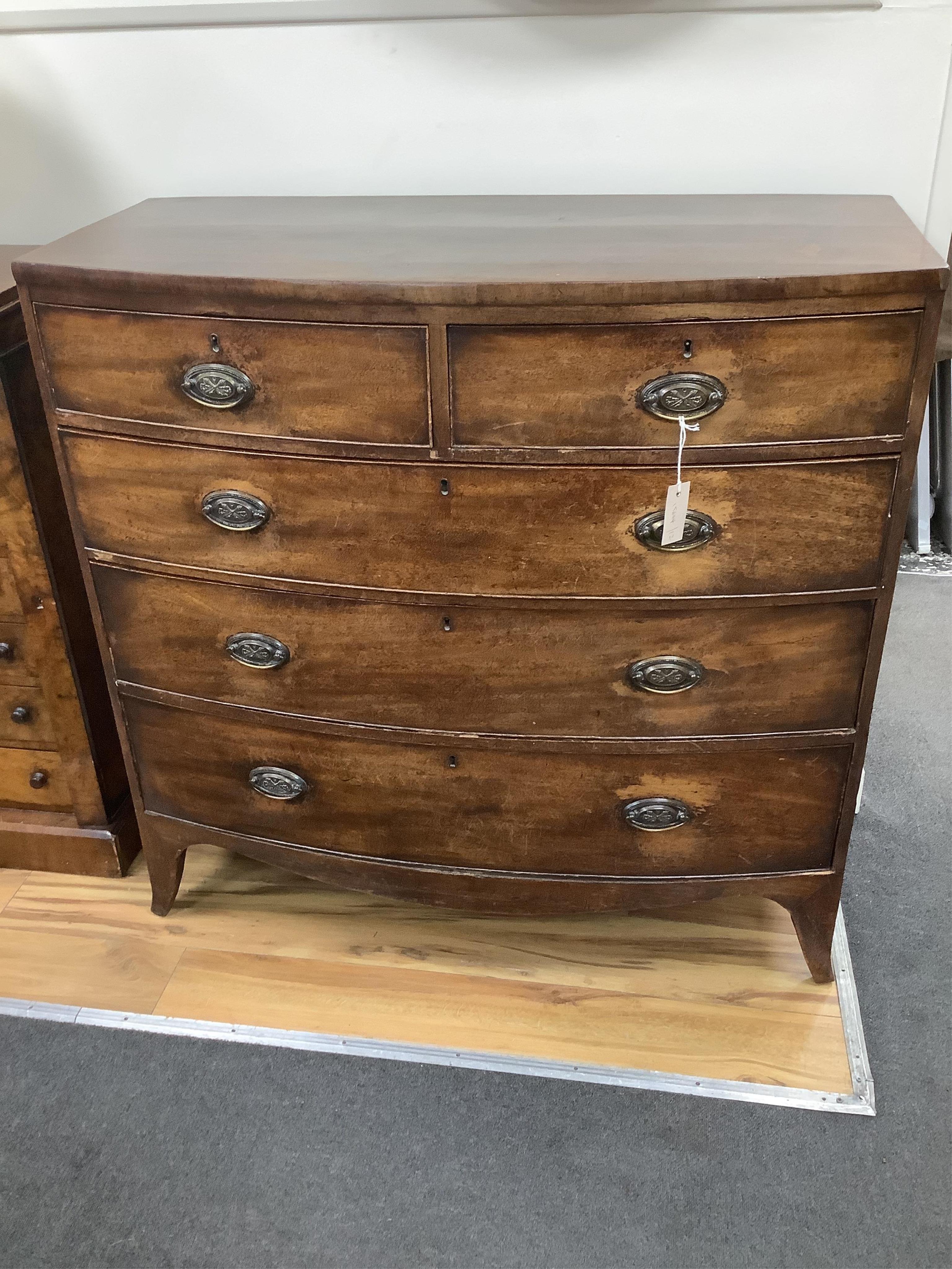 A Regency mahogany bowfront chest, width 105cm, depth 49cm, height 104cm. Condition - poor to fair